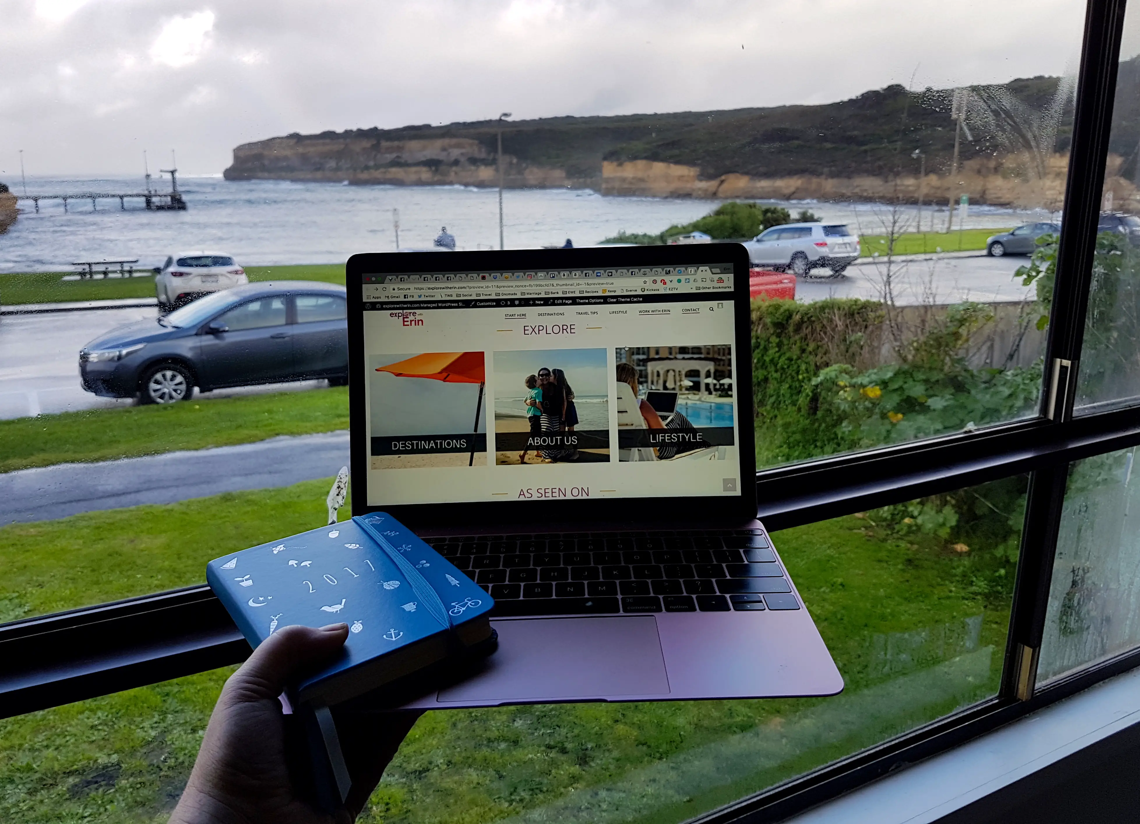 Pivot your travel blog career - computer at beach
