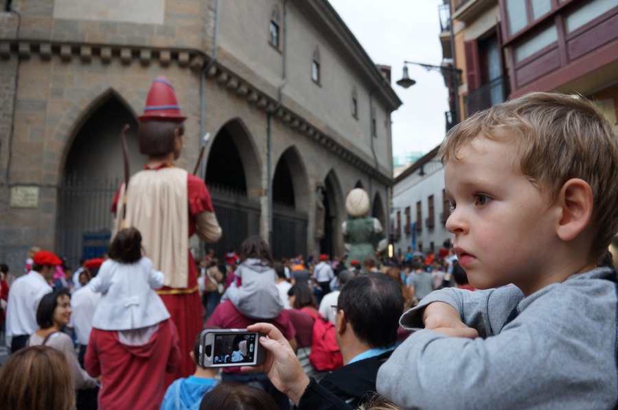 My Kids Running With The Bulls in Pamplona Spain | San Fermín Txikito Giants Parade