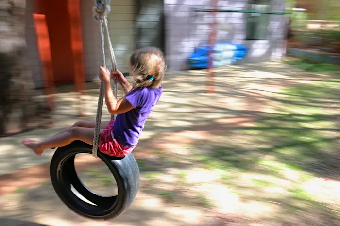 Visiting Down South - kids on swing