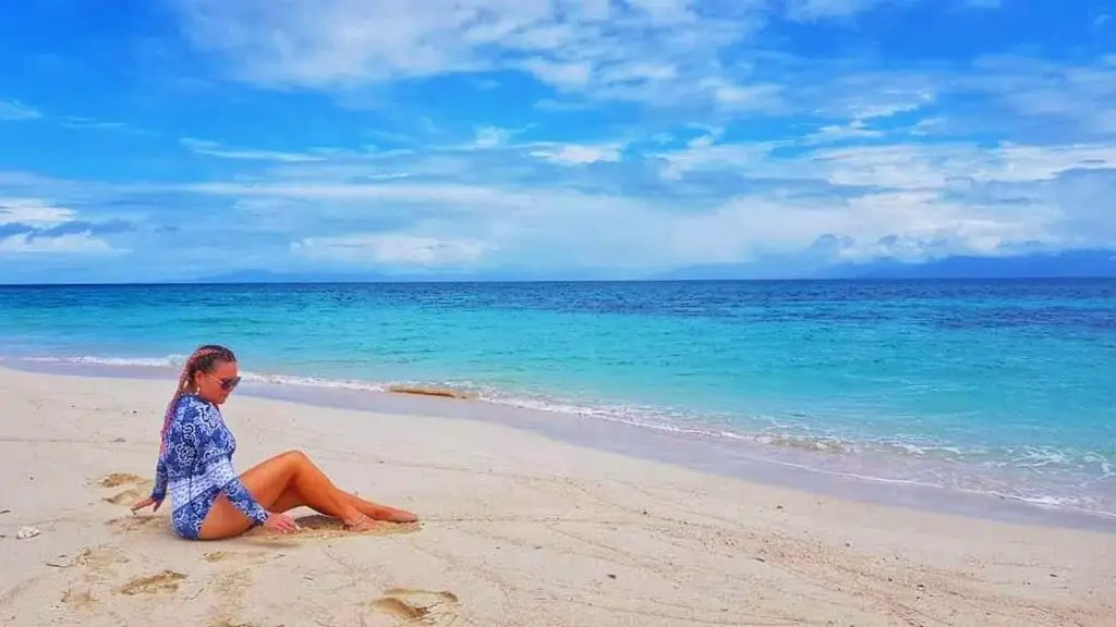 Australia's border opening - girl on beach