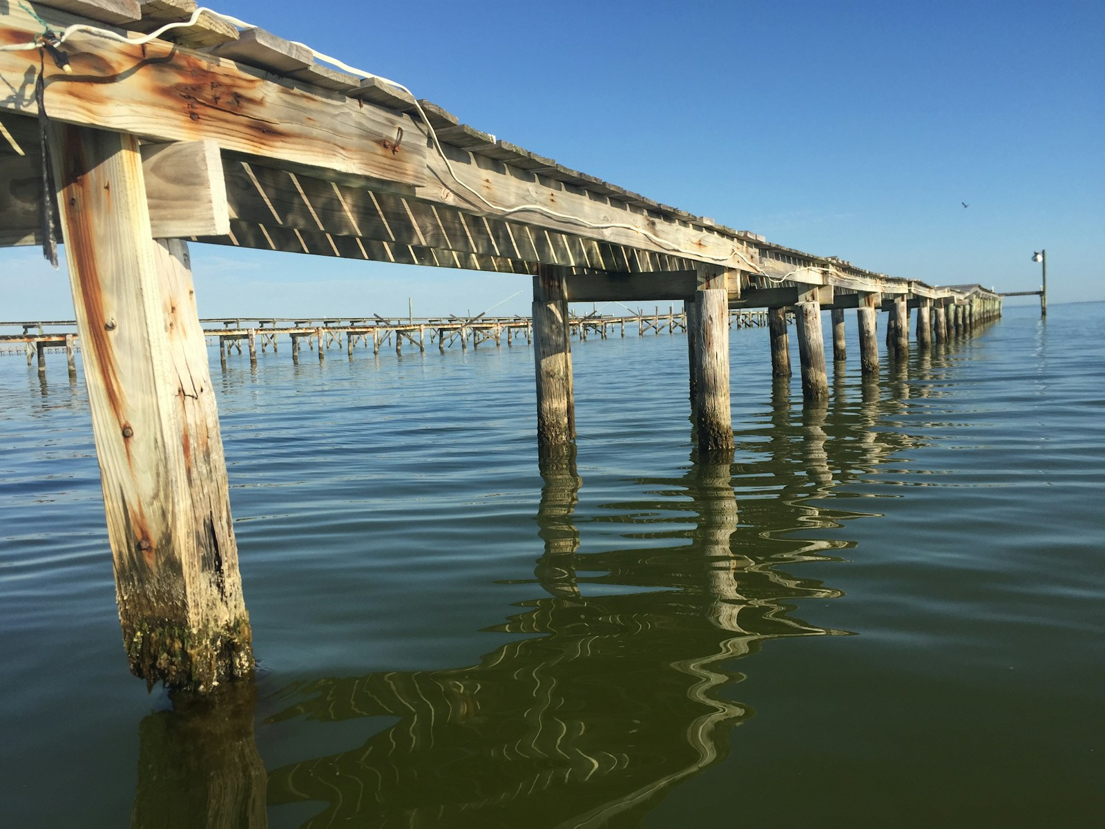 a wooden pier extending out into the water